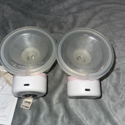 Electric Hands Free Breast Pump + Haaka + Breast Pads. 