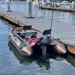 12 Ft Inflatable Boat With 8 Hp Nissan Outboard 