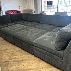 Delivery available gray modular sectional couch