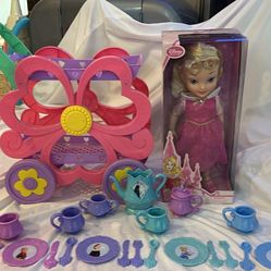 Brand new still in the box, Disney doll plus tea, cart, and accessories