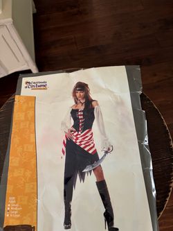 Pirate outfit includes skirt, striped sash, and two chiffon sleeves size large