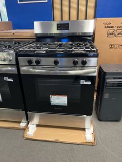 Frigidaire stainless and black gas range