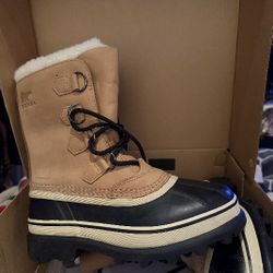 Sorel Women's Caribou Waterproof Boot
Ladys Size 7
NEW IN BOX 
WITH TAGS