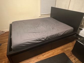 IKEA queen sized bed with 2 storage boxes