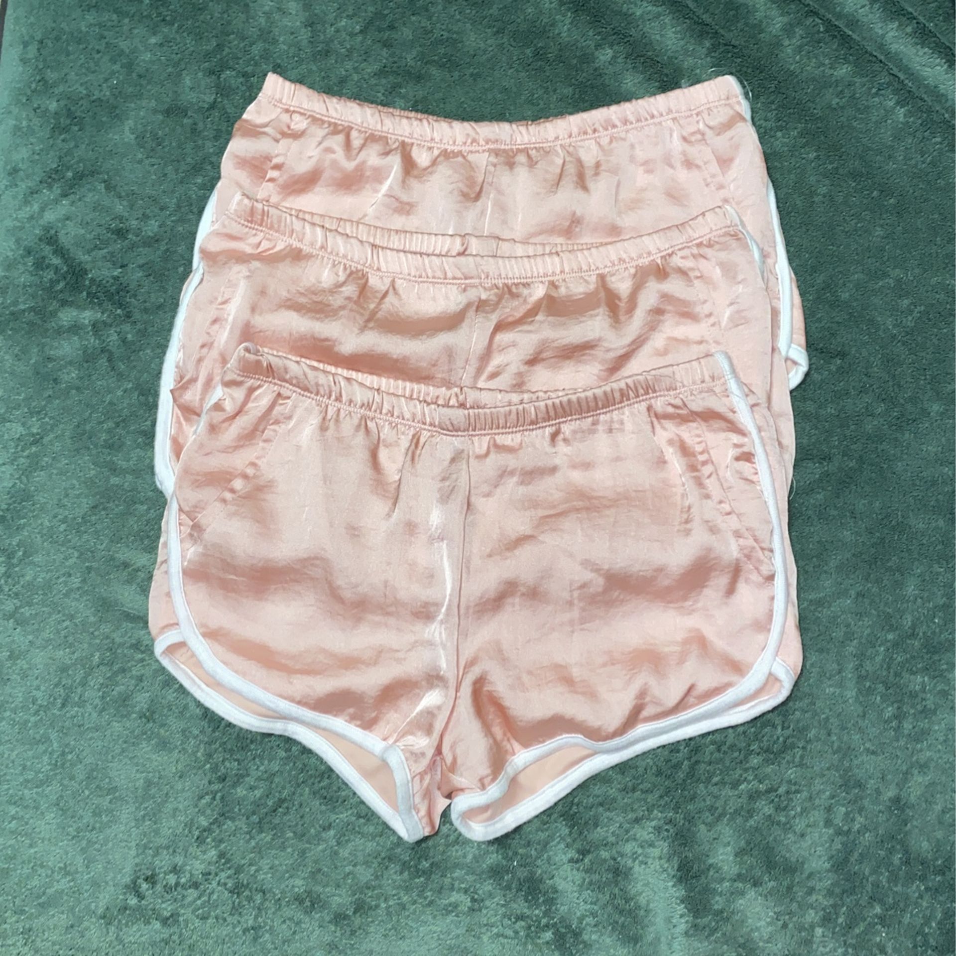 3 pink silky shorts