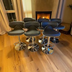 $60 each - over 10 Brand New In Box Black Leather Bar Stools, Swivel and Adjustable Chairs 24”-31” tall to the seat, great as counter chairs, kitchen