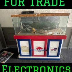 FOR TRADE 75 GALLON FISH TANK AND STAND.