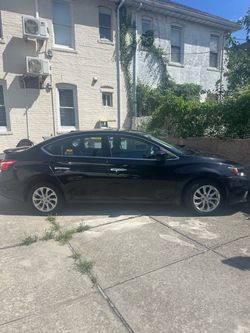 Black Nissan Sentra Sedan