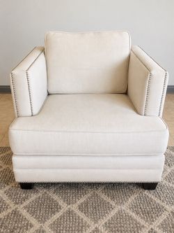 Cream Upholstered Accent Chair with Nailhead Trim