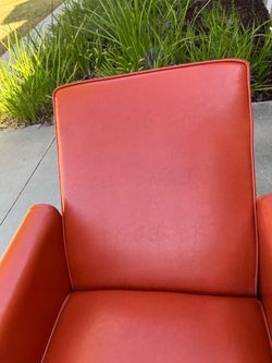 Orange faux leather recliner