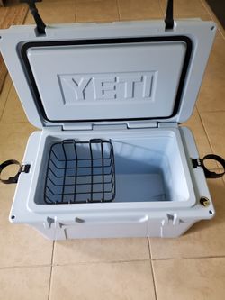 Yeti 45  Tundra cooler blue with basket and 2 sid hol cups, all in good shape!