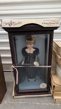 Antique doll and glass wooden case
