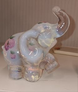 Vintage Fenton opalescent art glass elephant figurine.