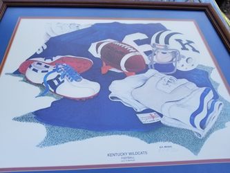 Frames and signed by E R McIntosh .basketball and football prints..$75 for both obo