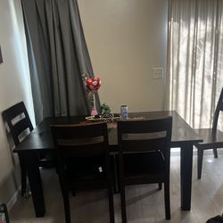 6 seat wooden  dining table (Dark brown )