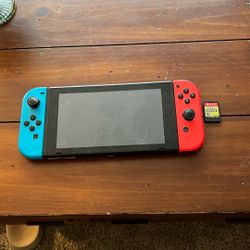 Nintendo Switch (red And Blue) With Super Mario U Deluxe