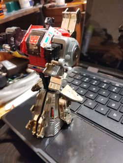 An original dino bot 1986 from The transformers