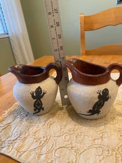 Southwest Mexican pottery set of 2 small pitchers with lizard design. 5 inches. Rustic.