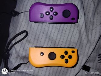 Nintendo Switch Joy-Con Controllers Purple and Orange