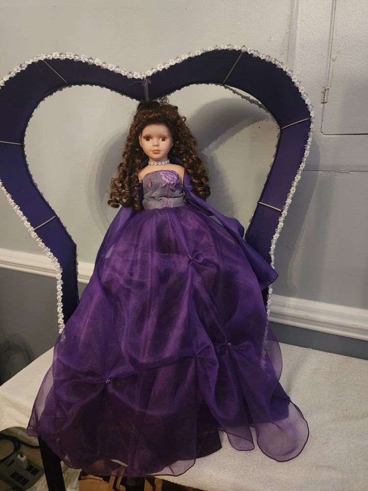 Porcelain Doll in Purple Dress