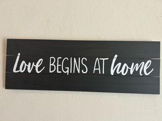 Wooden wall decor sign.