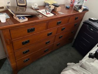 Large 9 drawers solid wood dresser… good condition. 66” wide 38” high “ 18” depth $150