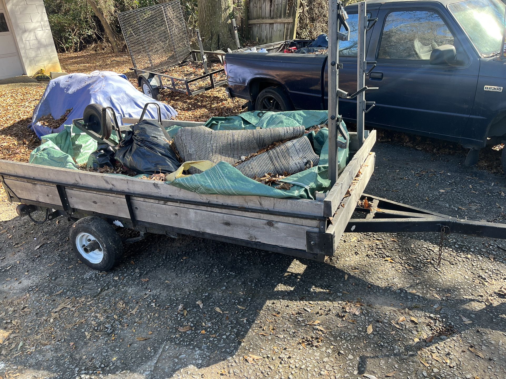 4x8  Tilt Trailer.     With Weed Whacker Racks.     