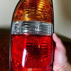 Toyota Tacoma OEM left tail light assembly