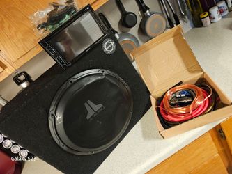 Pioneer multimedia deck + JL Audio 12" sub + 4 ga amp install kit