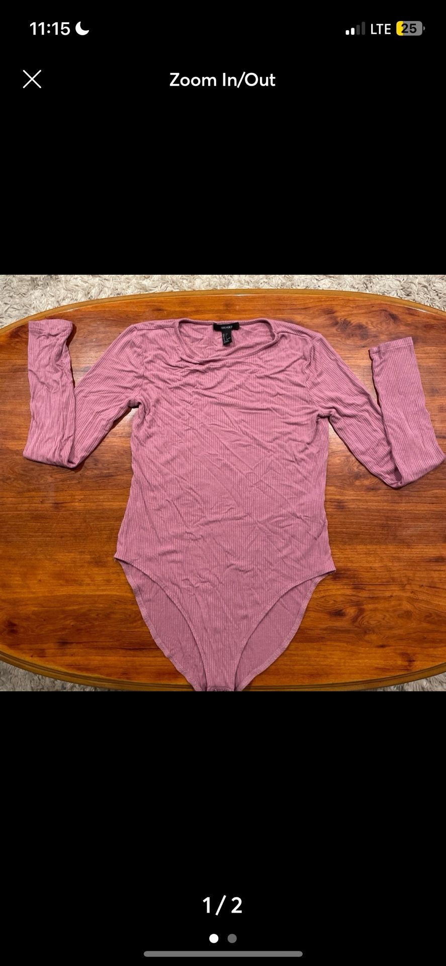 NWOT women’s Pink Swim Body Suit Never used!