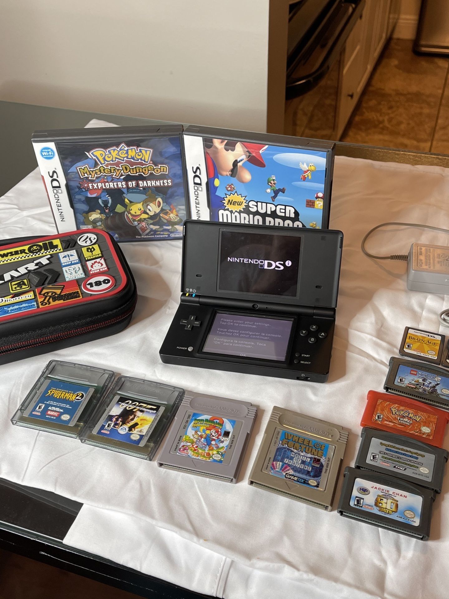 Nintendo DS Lite Console Lot Systems 14 Games W Case & Charger Authentic and tested Super Mario Land 2 Wheel of Fortune 007 the World is not Enough Sp