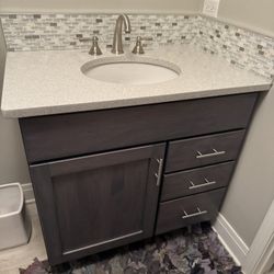 Custom Cabinet Gray And Countertop.  