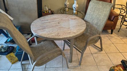 Stone patio table and 4 chairs + lounge chair