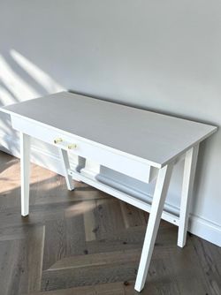 White writing desk with large drawer