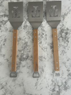 Set of 3 New Metal Spatulas with Can opener and Wooden Handler.