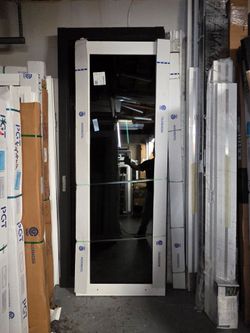 (2) Brand New PGT 59.5W x 90.5H Impact Sliding Glass Door (Dark Tint) with Frame and Handles