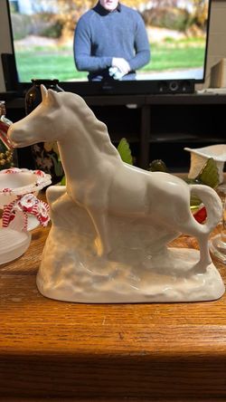 vintage white porcelain horse figurine statue.