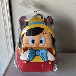 Disney Loungefly Pinocchio w/Donkey Tail