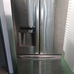 Stainless Steel Refrigerator And Stove 