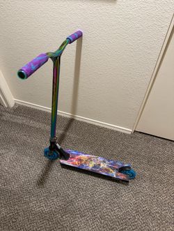 Custom Envy Prodigy Stunt Scooter with triple 8 helmet