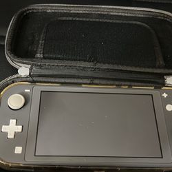 Nintendo Switch Lite + Case + 128gb SD Card