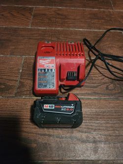 Milwuakee red lithium xc 5.0 battery & charger