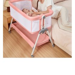 BRAND NEW IN BOX - ANGELBLISS Bedside Sleeper with Storage Basket, Easy Folding Portable Bassinet with Wheels