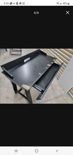 Computer table with pull out drawer.