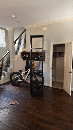 2 7’ish black wood shelves. Normal ware and tear, $40