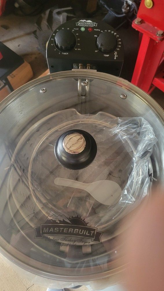 Electric Turkey fryer, broiler and steamer.