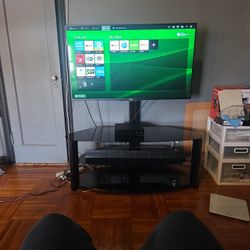 SONY TV WITH  STAND AND SOUND BAR AND SUB WOFER TV SIZE 42INCHES