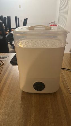Bottle warmer and bottle sterilizer