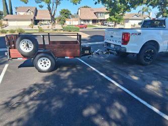 8' x 4' utility trailer , single axel leaf springs