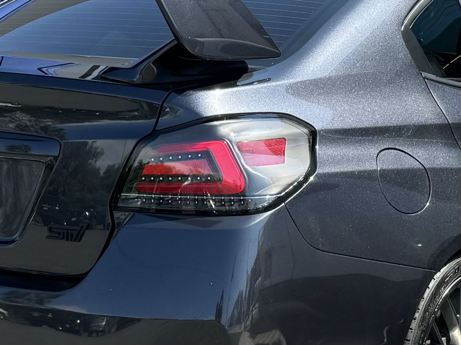 SubiSpeed USDM TR Style Sequential Tail Lights - Clear Lens/Black Base/Red Bar - 2015-2021 Subaru WRX / STI